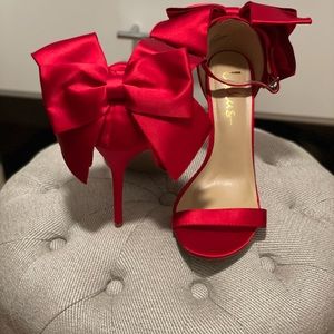 Red Heels with bow. Worn once for engagement photos.